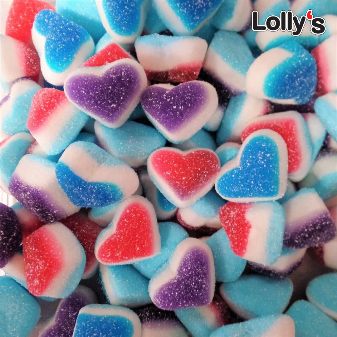 Bonbon en forme de coeur 3 couleurs en gros plan acidulés