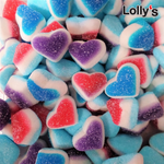 Bonbon en forme de coeur 3 couleurs en gros plan acidulés