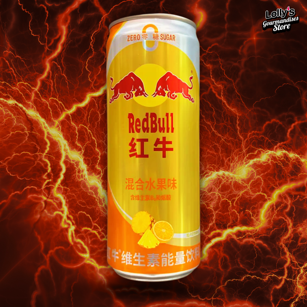 Canette de Redbull chinois Orange Ananas, de couleur orange et jaune et disposée sur un fond noir et orange avec des éclairs.