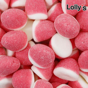 Bonbons rond couleur blanc et roses goût fraise en gros plan.