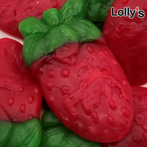 Bonbon en forme de fraise rouge et vert en gros plan