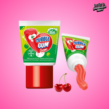 Image d'un tube imitation dentifrice avec un chewing-gum à l'intérieur goût cerise. Le tube est vert avec un bouchon rouge. Sur celui-ci on peut voir un petit bonhomme en forme de liquide de dentifrice qui fait une bulle pour rappeler le chewing-gum. 